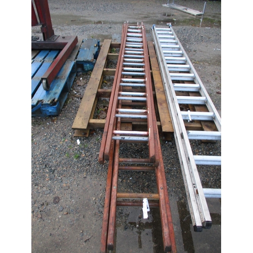 67 - Two wooden extension ladders