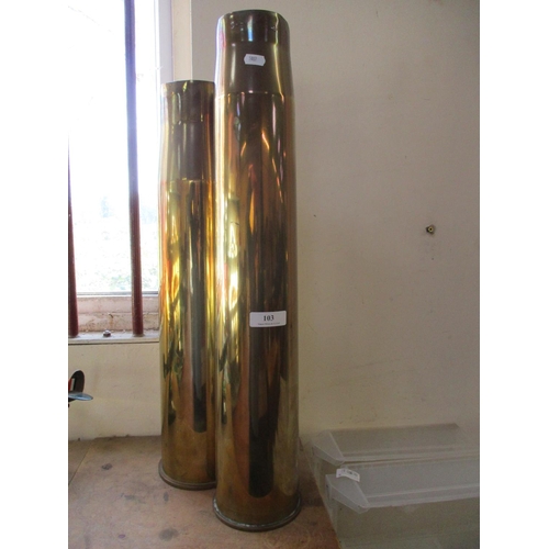 103 - Two large brass shell cases