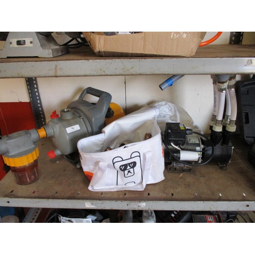 76 - A shower pump, Hozelock garden pump and assorted fittings