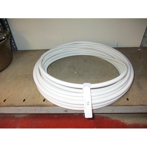 94 - A roll of copper pipe