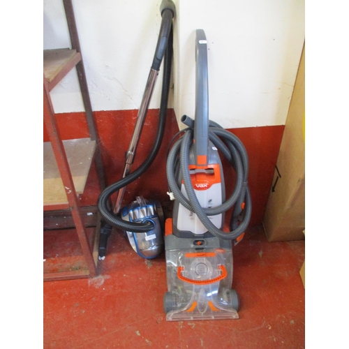 403 - A Vytronix vacuum cleaner together with a Vax Rapide ultra carpet cleaner