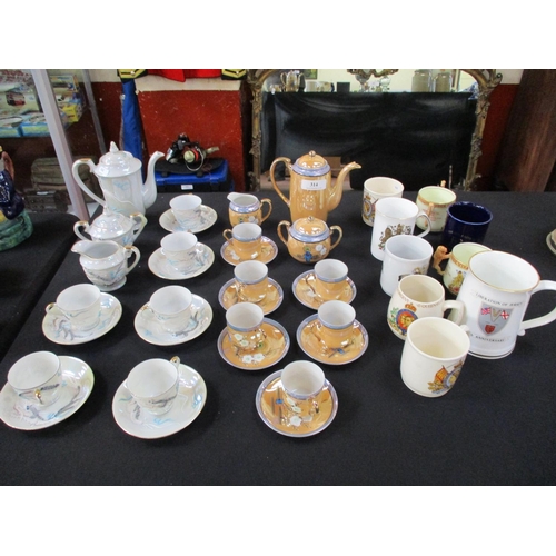 314 - Two oriental lustre coffee services together with a collection of commemorative china