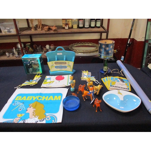 322 - A collection of vintage and retro Babycham items and memorabilia