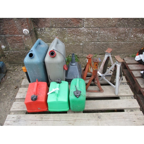 33 - Two pairs of axle stands, five plastic fuel containers and a funnel