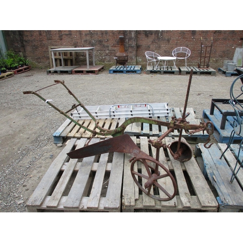 65 - A vintage Ransomes horse drawn planting plough