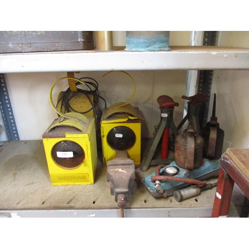 129 - Three road warning lamps together with assorted tools