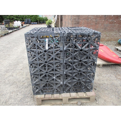 38 - Four black plastic ormer soak away/water storage crates