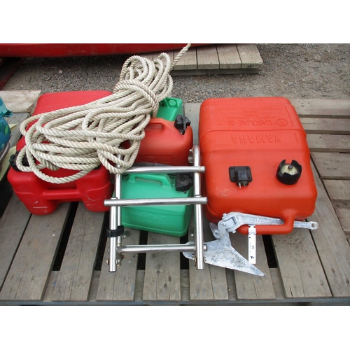 39 - Five fuel cans together with an anchor, a boat ladder, and a coil of rope