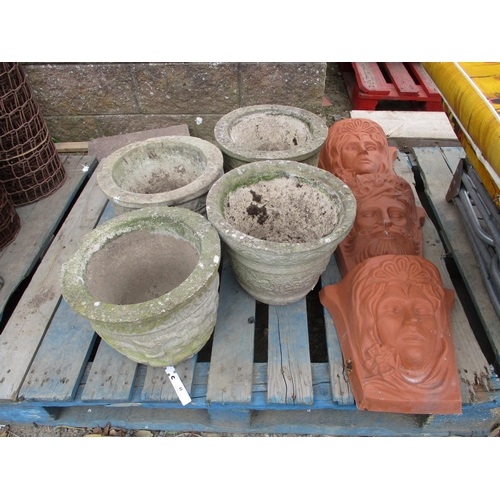 41 - Four reconstituted stone planters together with three plastic wall planters modelled in the form of ... 