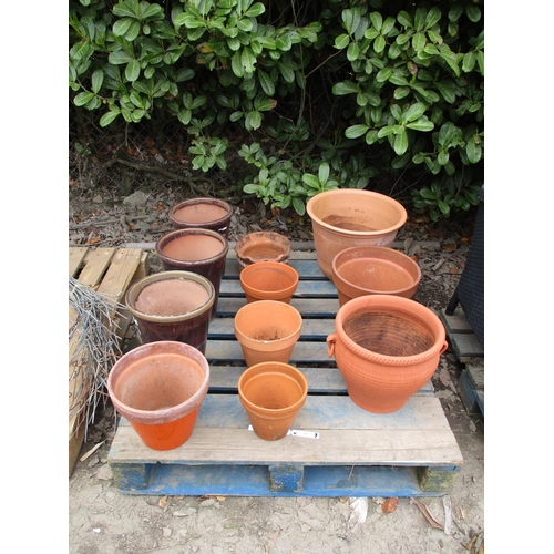 62 - A quantity of terracotta pots