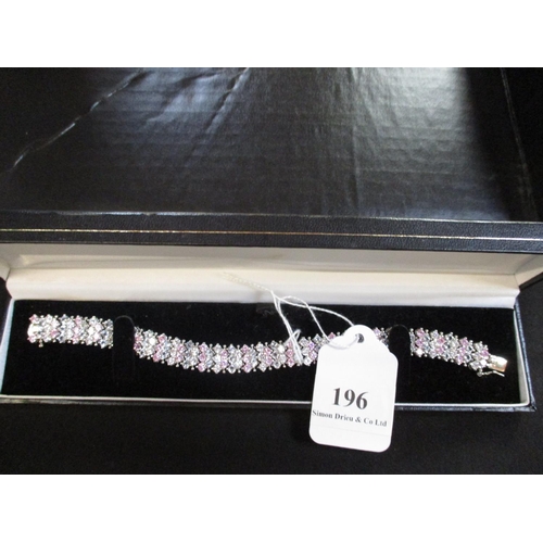 196 - A sterling silver bracelet (Birmingham 2005) set with multiple stones