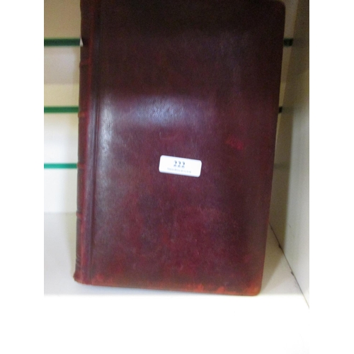 222 - A leather album containing postcards, photographs and greetings cards