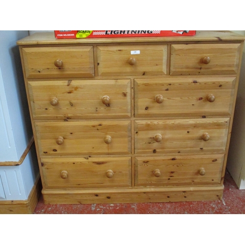 240 - A pine chest of nine drawers