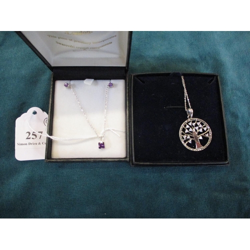 257 - A silver tree of life pendant together with a silver and amethyst chain and pendant