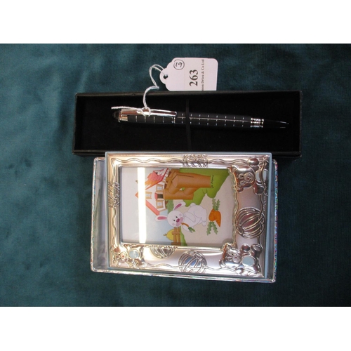 263 - A silver baby boy photograph frame together with a Mont Blanc style pen