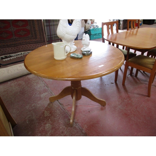 278 - A beech pedestal circular table