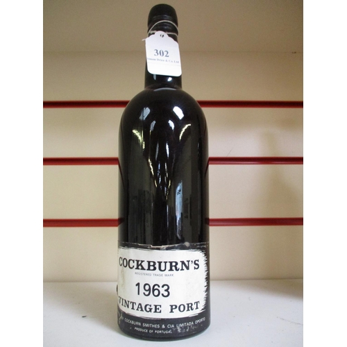 302 - A bottle of Cockburn's 1963 vintage Port