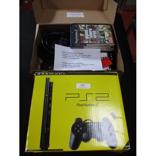 351 - A PS2 games console and games