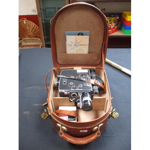 358 - A Bolex Paillard cine camera in fitted case