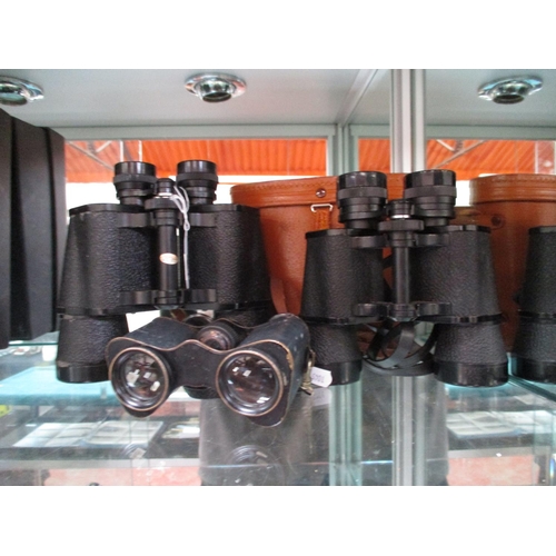 398 - Three pairs of binoculars