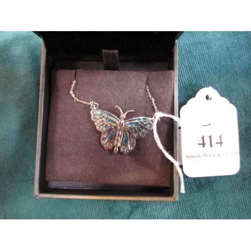 414 - A silver and enamel set butterfly pendant