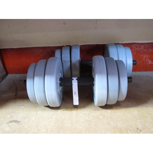 394 - Two sets of dumbbells