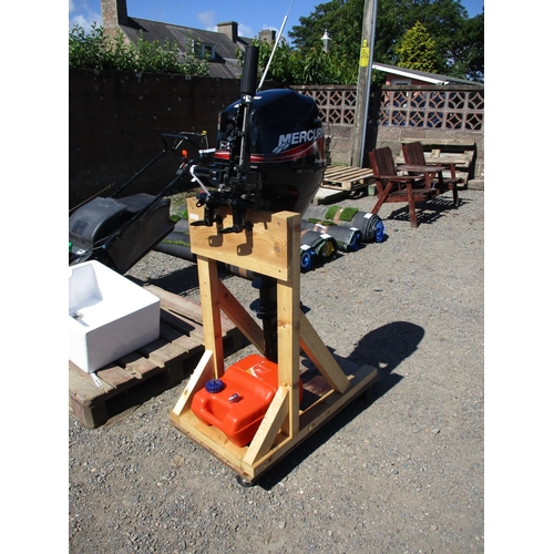 42 - A Mercury 9.9hp four stroke outboard engine with Plastimo fuel tank (stand not included)