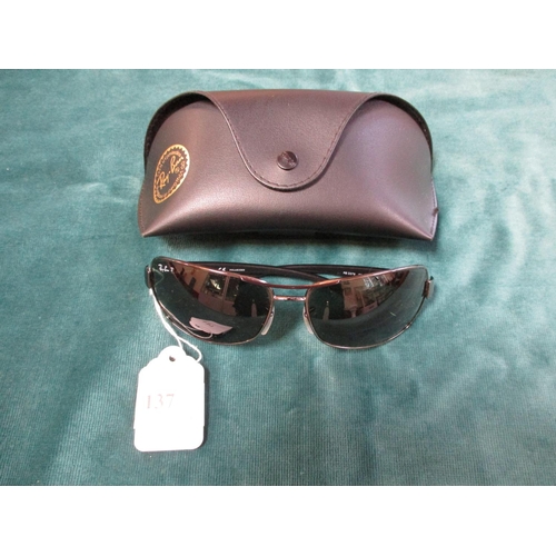 137 - A pair of Ray-Ban sunglasses complete with case