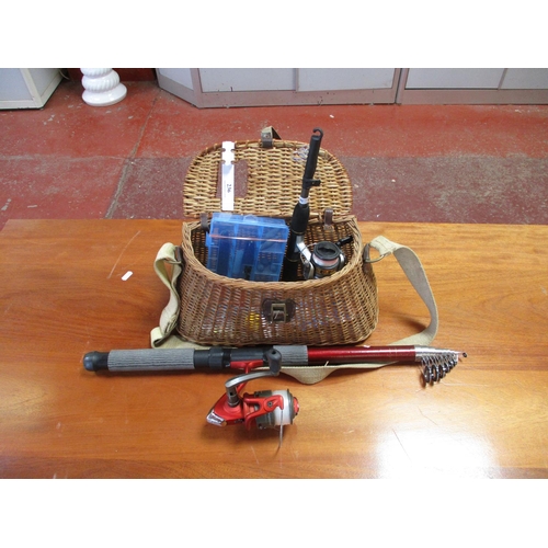 236 - Two telescopic fishing rods complete with reels, a wicker fishing basket and an assortment of fishin... 