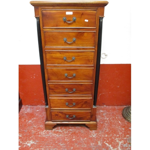 295 - A narrow mahogany chest of seven drawers