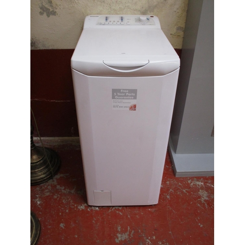 299 - A Hoover Nextra 6kg capacity top loading washing machine