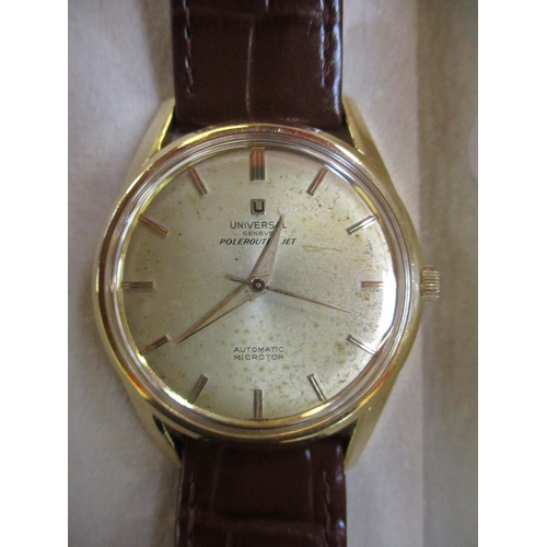 162 - A gentleman's mid century Universal 18 carat yellow gold automatic wrist watch