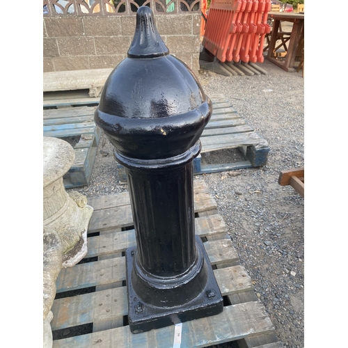 30 - A cast iron bollard modelled in the form of a fluted column