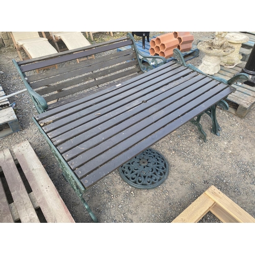 37 - A cast metallic and wooden garden bench together with a matching table, a pair of cast metallic benc... 