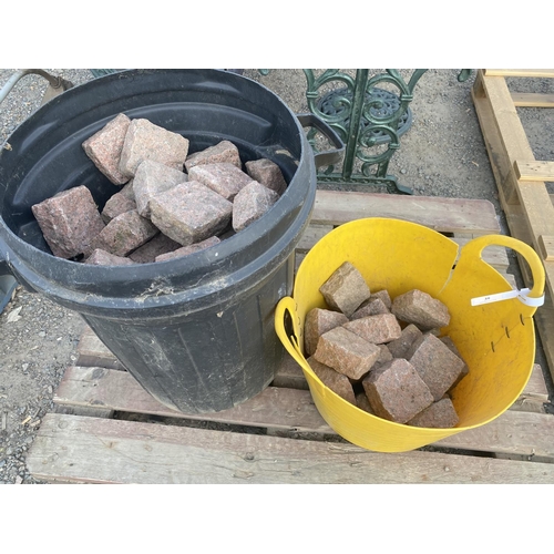 39 - A quantity of pink granite sets