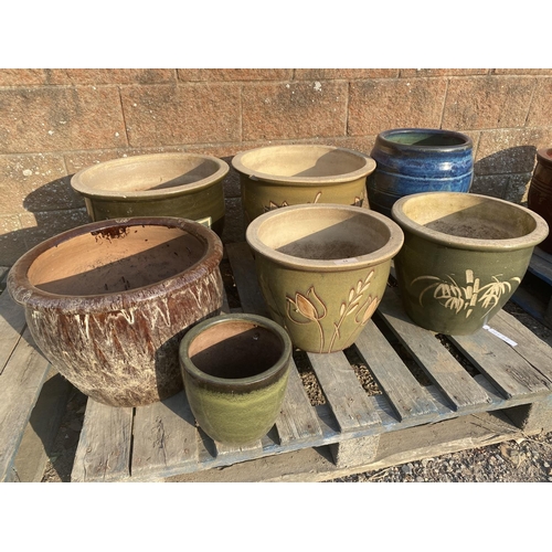 54 - An accumulation of salt glazed stone ware planters