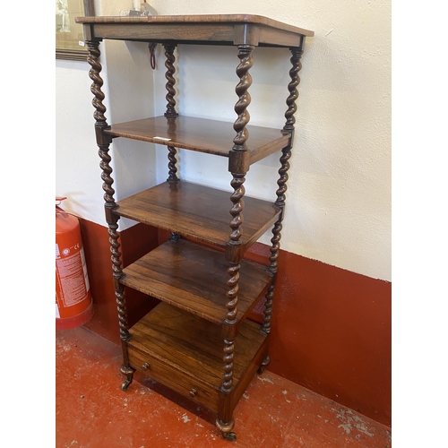 235 - A Victorian rosewood five tier barley twist what not fitted a full drawer below