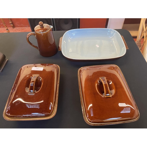 247 - A pair of Denby stoneware lidded casserole dishes together with another casserole dish and a lidded ... 