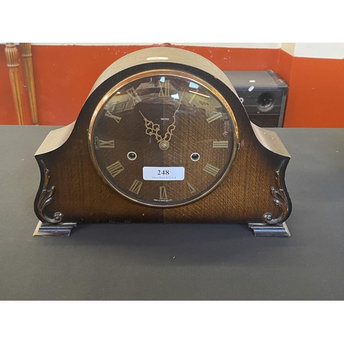 248 - A mid century Smith's oak cased mantle clock in running order