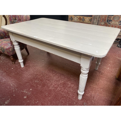 269 - A vintage over painted pine farmhouse table