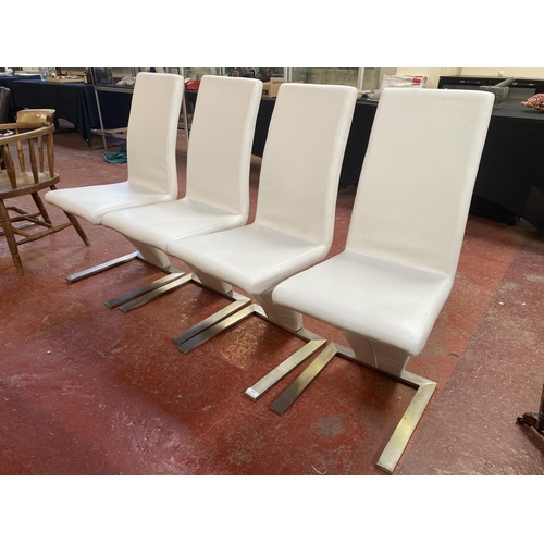 273 - A set of four contemporary aluminium and white leather upholstered dining chairs