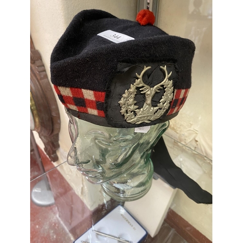 344 - A Scottish regimental side cap (bust not included)