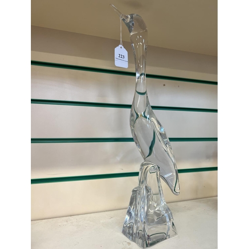 223 - A Daum glass model of a bird on a rock pinnacle (47cm tall)