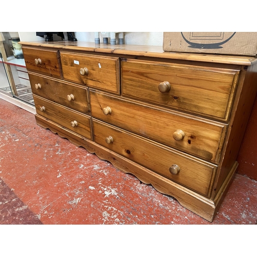 342 - A honey glazed pine chest of seven drawers