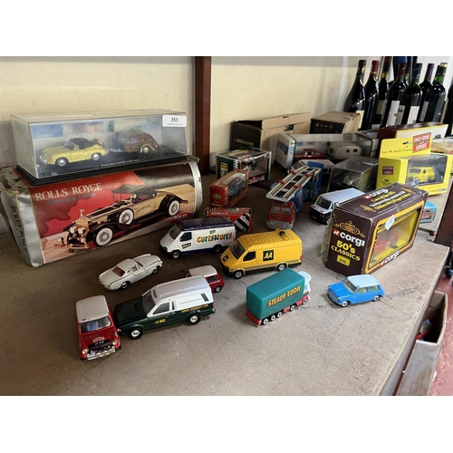 353 - A collection of mid century and other model vehicles together with two high performance security lig... 