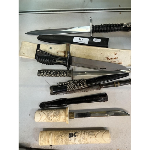 381 - A selection of daggers and knives