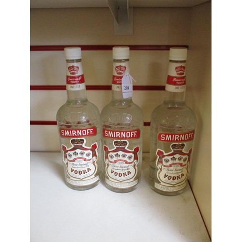 298 - Three 1 litre bottles of Smirnoff vodka