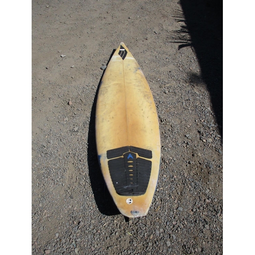 61 - A Cono surfboard