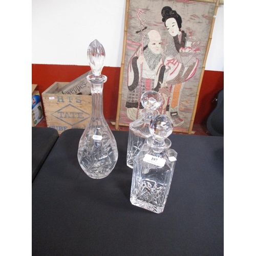 197 - Two crystal whisky decanters together with one other