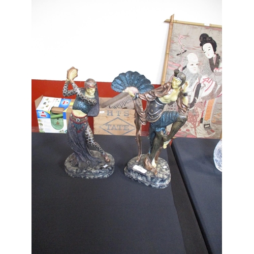 198 - Two art deco style dancing lady figures